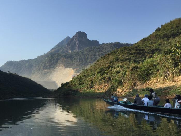 Students approaching a dam site on the Nam Tha River, Laos.