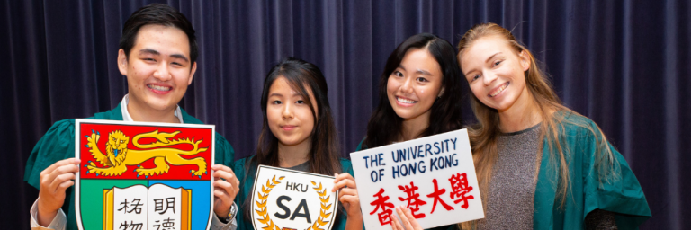 4 student ambassadors wearing green gown holding foamboards of HKU logo and student ambassador logo